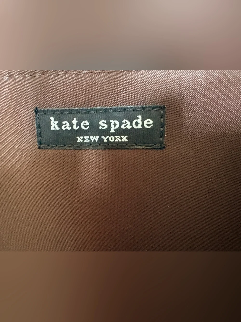 kate spade brown tote with black logo patch